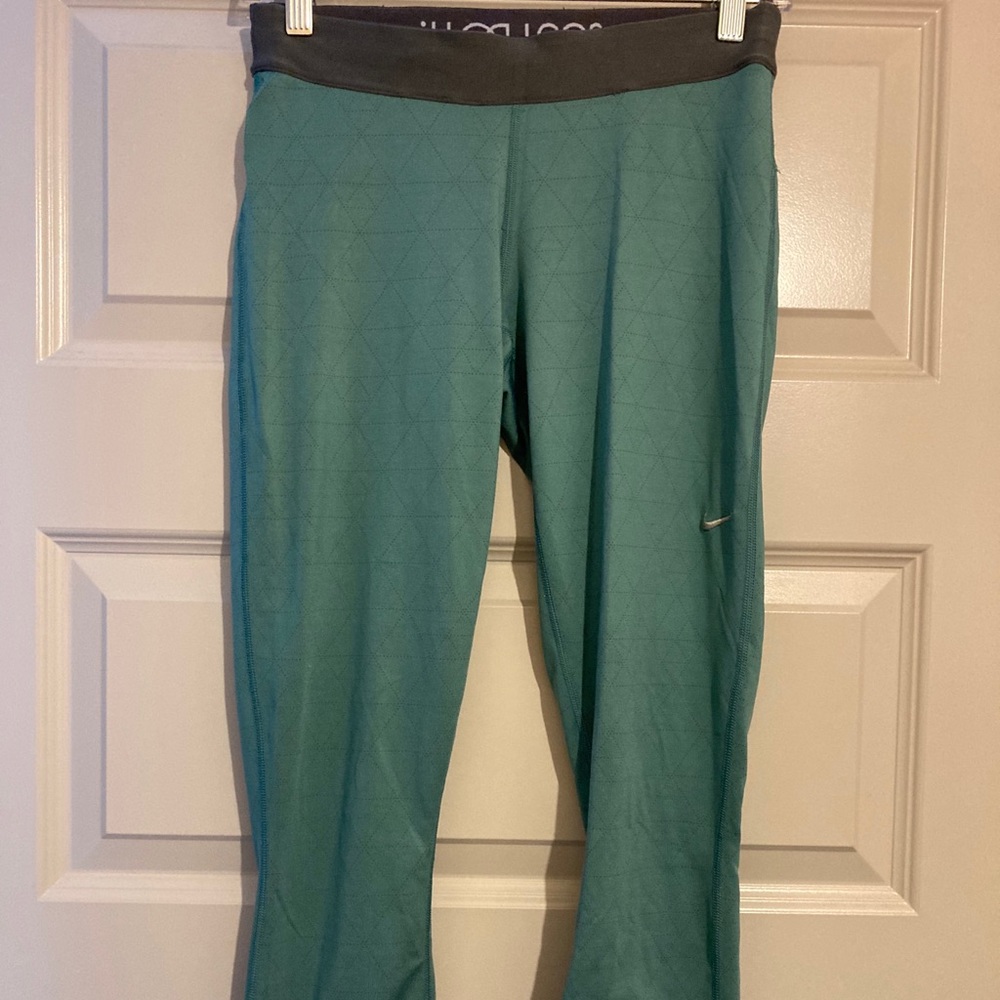 Nike teal patterned crop leggings, size M